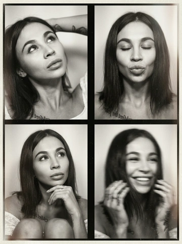 Photorealistic black-and-white vintage photobooth collage made of four frames in a 2x2 grid, separated by thin black dividers and surrounded by a slightly uneven paper border. Each frame shows the same woman in an intimate studio/photobooth setting against a plain light backdrop, captured with an authentic analog look: heavy film grain, soft contrast, halation, dusty scan artifacts, subtle scratches, and mild vignetting. Overall feel: 1990s/ early-2000s editorial photobooth print, raw and unretouched, candid "caught-between-moments" mood.
Use the uploaded photo as the basis and preserve the woman's face, makeup, likeness, and all original features without changing proportions or shape; keep natural facial micro-detail, pores, and subtle asymmetry, preserve the original head size.
Frame 1 (top-left): tight close-up, head tilted up and to the left, eyes looking upward, one arm raised behind the head, dreamy
Frame 2 (top-right): medium close-up, eyes closed, head slightly tilted, she subtly pushes/pouts her lips forward to show them (soft pout), calm playful mood; hair framing the face.
Frame 3 (bottom-left): medium close-up, seated with knees softly out of focus at the bottom, chin resting on one hand, gaze looking up to the right, thoughtful expression.
Frame 4 (bottom-right): medium close-up, the woman is laughing, but the frame is strongly blurred-heavy motion blur/defocus as if she moved during the shot; smile and face still recognizable, edges smeared, hair and hands noticeably streaked, imperfect photobooth misfire energy.
Print/scan look: monochrome with warm gray tones, slightly faded blacks, uneven exposure between frames, faint light leaks, paper texture visible, edges not perfectly straight, like a scanned photobooth print. High resolution, but intentionally imperfect, analog realism.